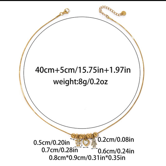 C1272 Collar dorado dije niña y niño corazón cobre chapado en 18k