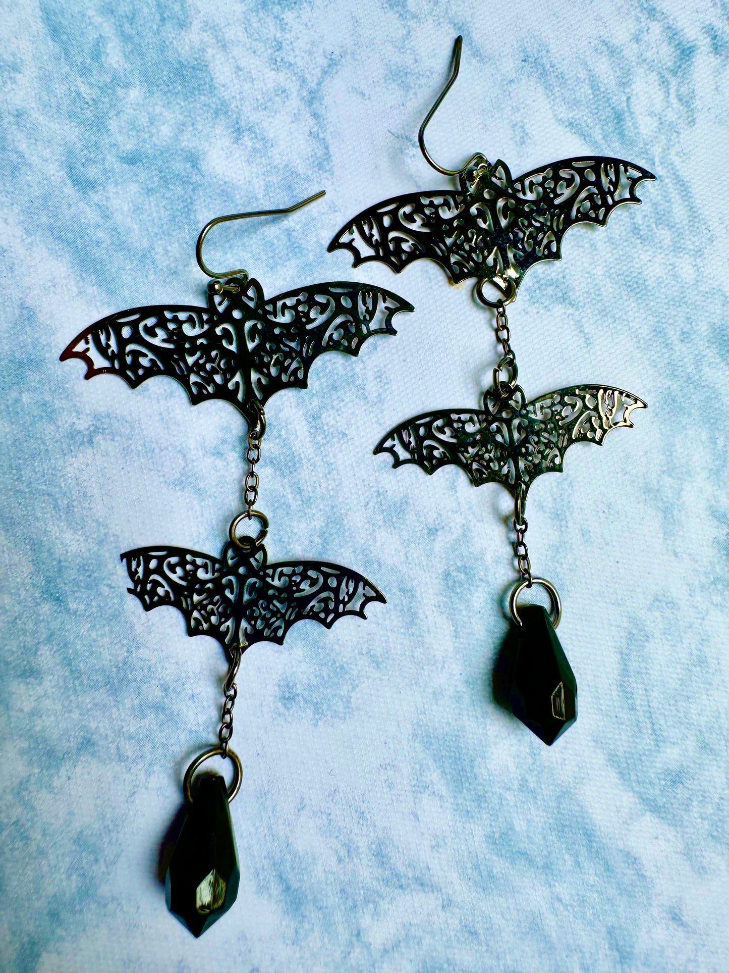 E263 Aretes murciélago metal ligero 8.5cm