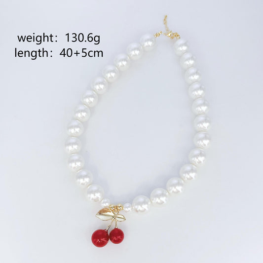 C805 collar perlas cereza roja aleacion 25cm largo 5cm dije