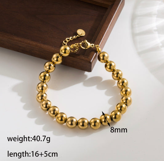 B712 pulsera borlas doradas acero inoxidable chapado en oro de 18k