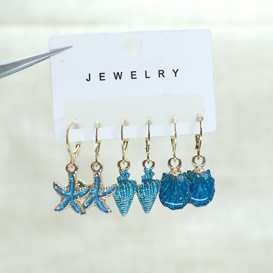 E3613 Conjunto aretes estrella de mar aleacion 3cm