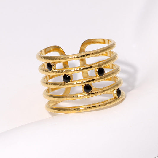 A527 Anillo dorado puntos negros acero inoxidable chapado en oro de 18k abierto