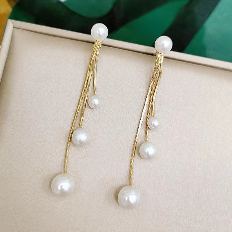 E3581 Aretes perla colgante poste de plata 7cm