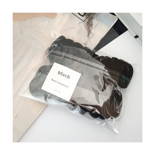 ACS02  Ligas para el cabello color negro incluye 50 piezas