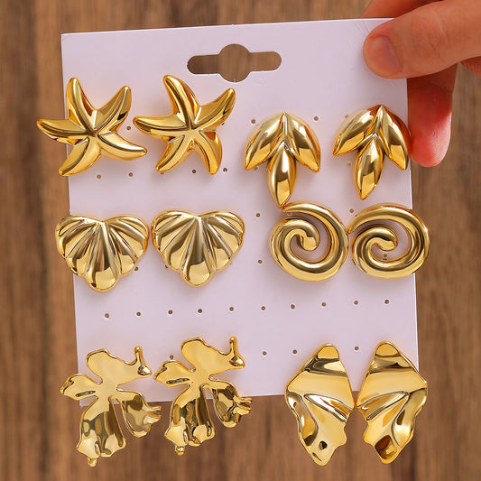 E5974 Conjunto aretes dorados figuras distintas 4cm aleacion