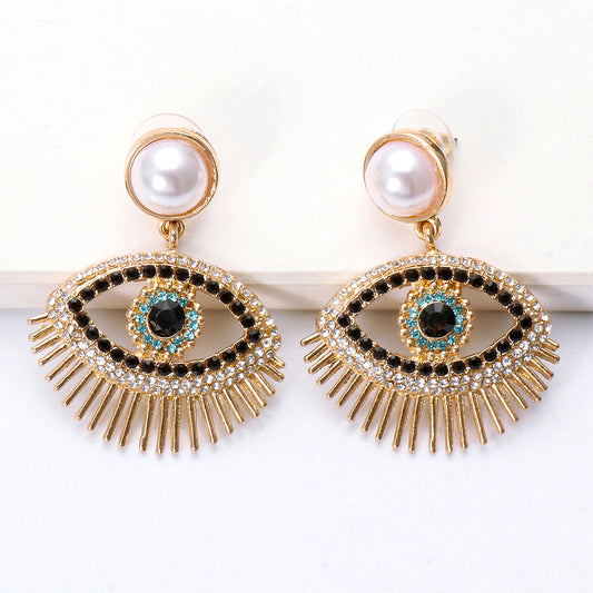 E3964 Aretes ojo perla aleacion 3.5cm