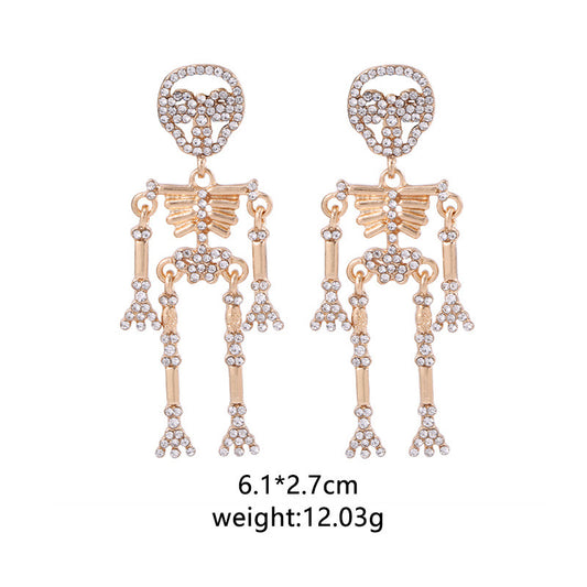 E3907 Aretes esqueleto dorado aleacion 6cm