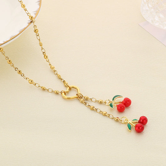 C828 collar cerezas acero inoxidable chapado en oro de 18k 24cm largo 5.5cm dije