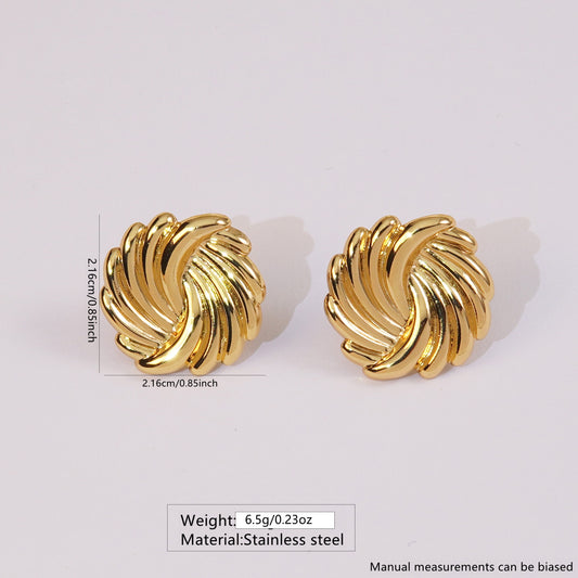 E3625 Aretes flor dorada acero inoxidable 2cm