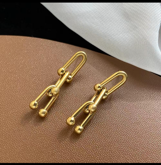 E4751 Aretes geométricos dorados acero de titanio 3.5cm