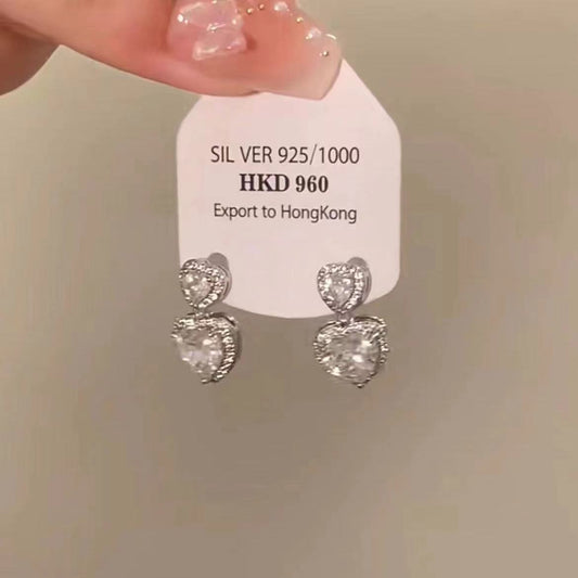 E3850 Aretes corazón plateado brillante aleacion 2cm