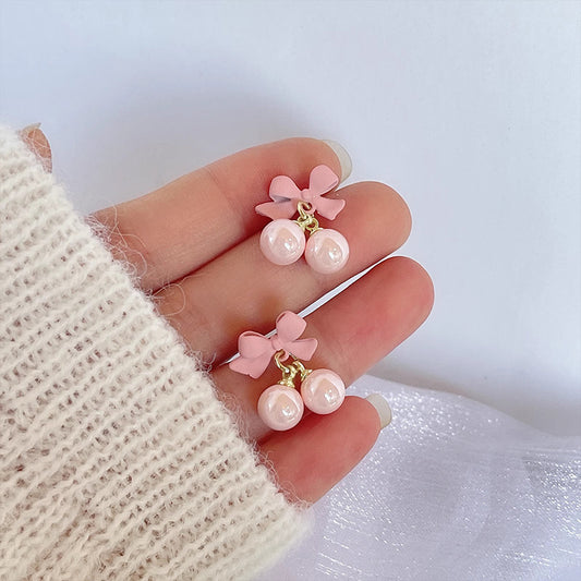E4067 Aretes moño perlas rosas poste de plata 2cm