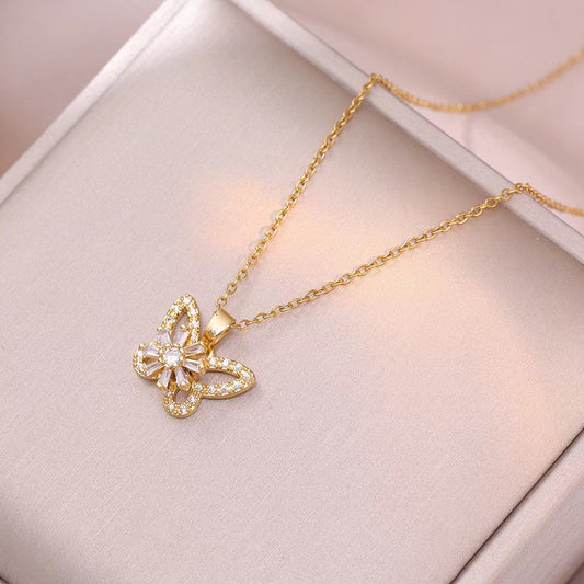 C1113 collar mariposa dorada acero inoxidable