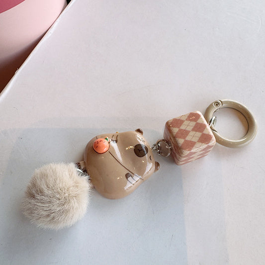 K79 Llavero Capibara pompon largo 9cm