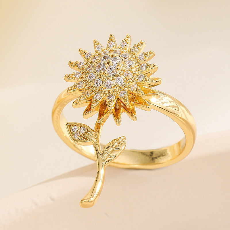 A191 Anillo giratorio girasol dorado acero de titanio 2cm