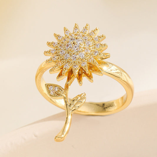 A191 Anillo giratorio girasol dorado acero de titanio 2cm