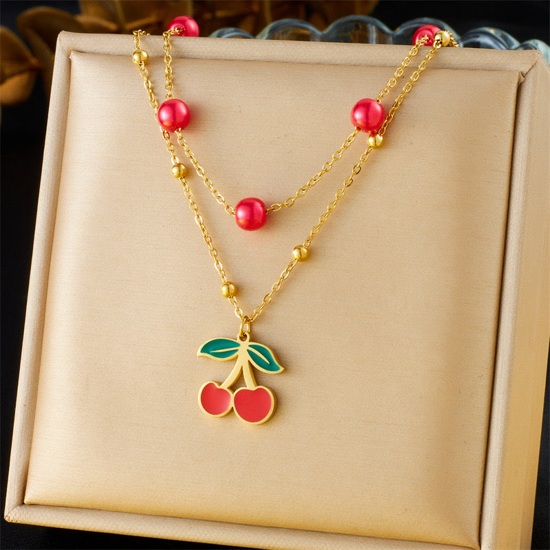 C661 Collar doble cereza acero inoxidable 24cm largo 2cm dije