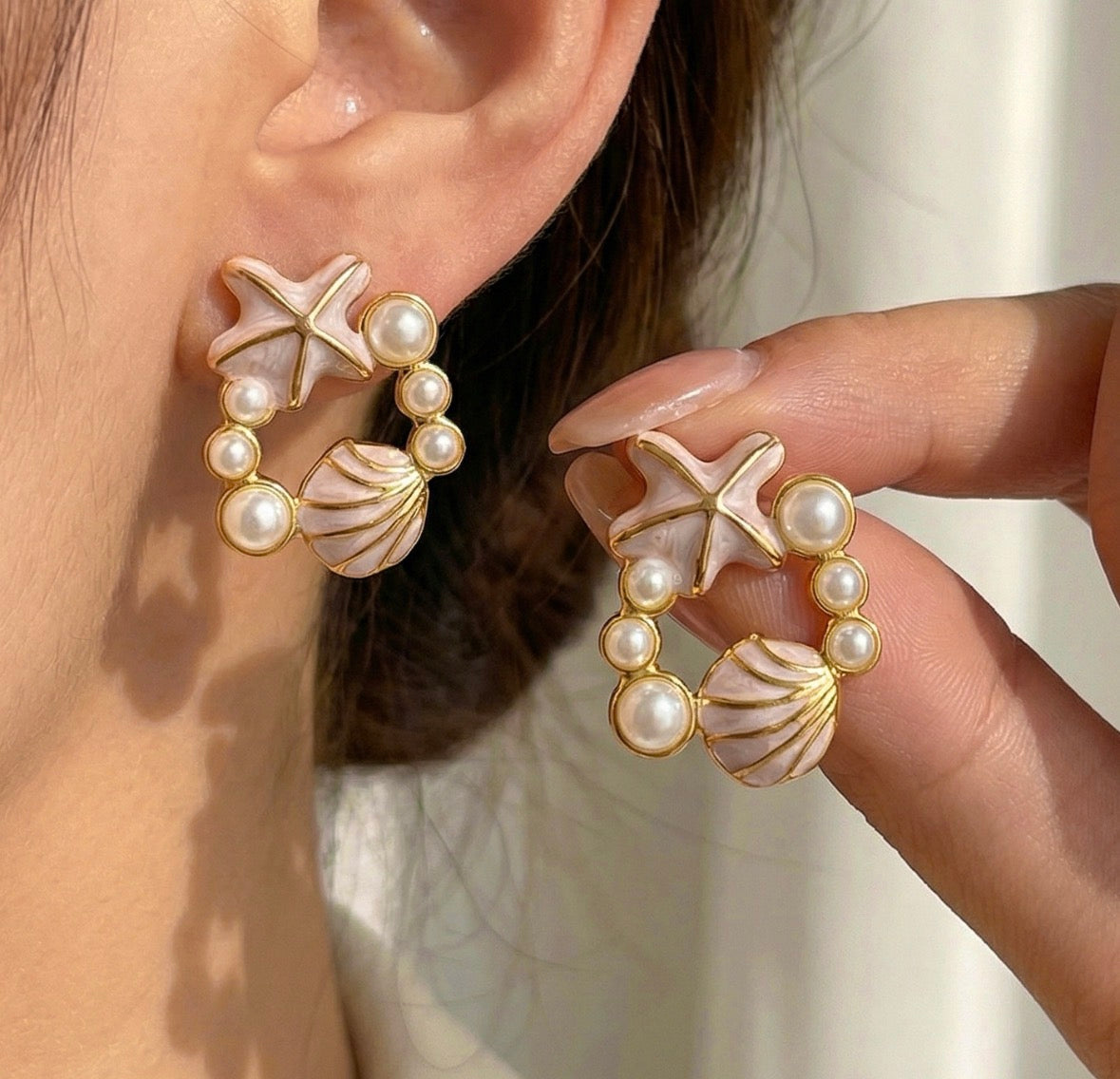 E5557 Aretes estrella y concha de mar nude acero inoxidable