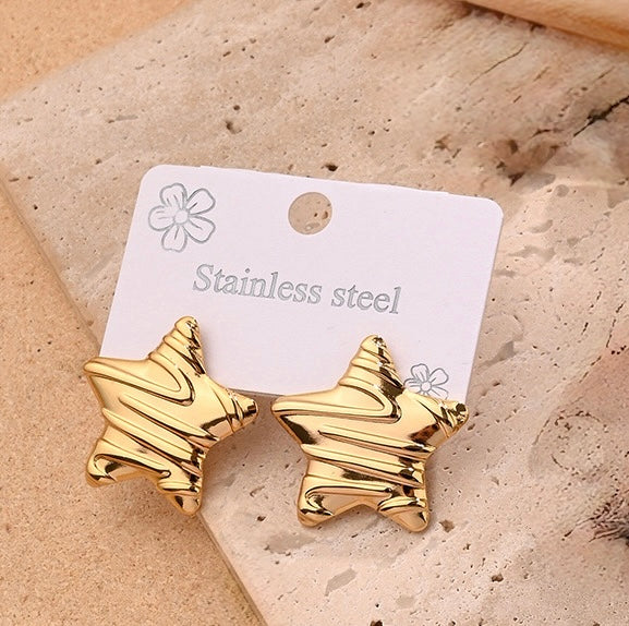 E4322 Aretes estrella dorada acero inoxidable 2cm