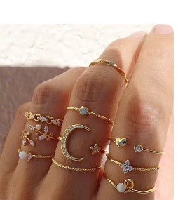 A605 Conjunto anillos incluye todos los de la foto medidas para todos los dedos va desde el 6 hasta el 8 aleacion