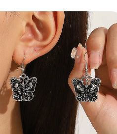 E4123 Aretes mariposa negra aleacion 2.2cm