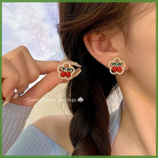 E3885 Aretes flor cereza poste de plata aleacion 1cm