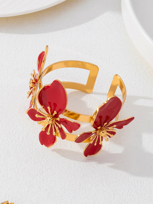 B895 Brazalete flores rojas abierto aleacion