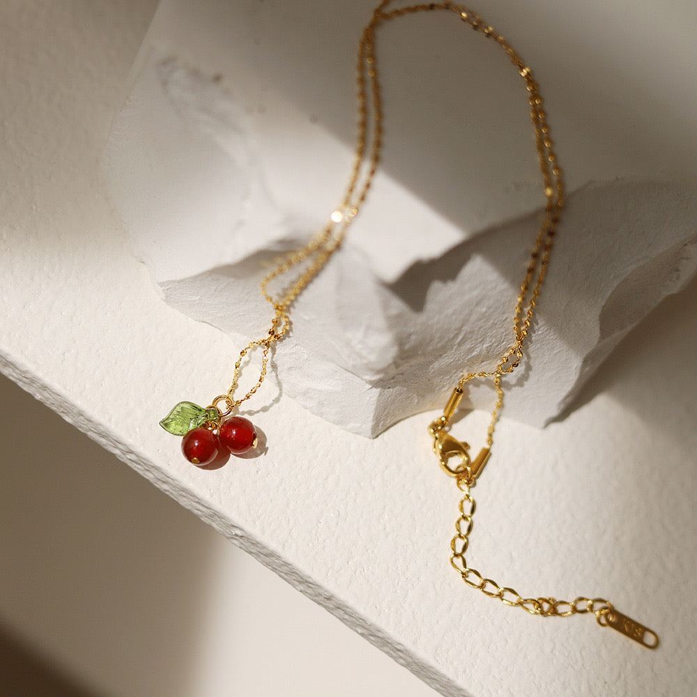 C487 Collar cereza acero inoxidable chapado en oro 18k largo 20cm dije 1cm