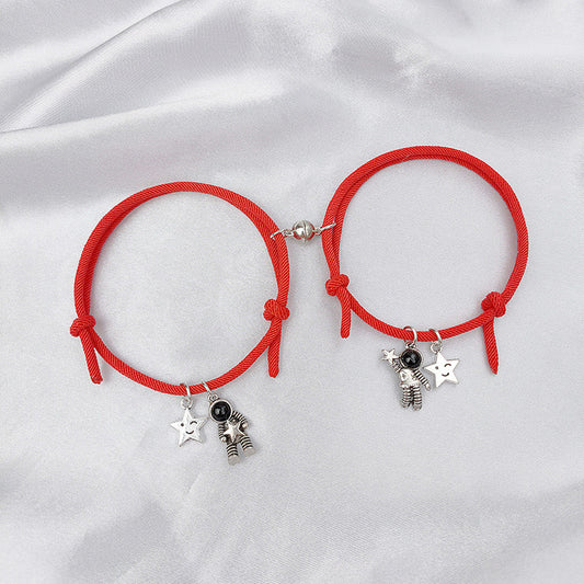B431R Pulsera dúo astronauta pareja