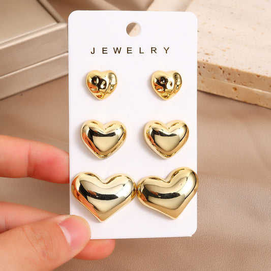 E3718 Conjunto aretes de corazón cobre 2cm