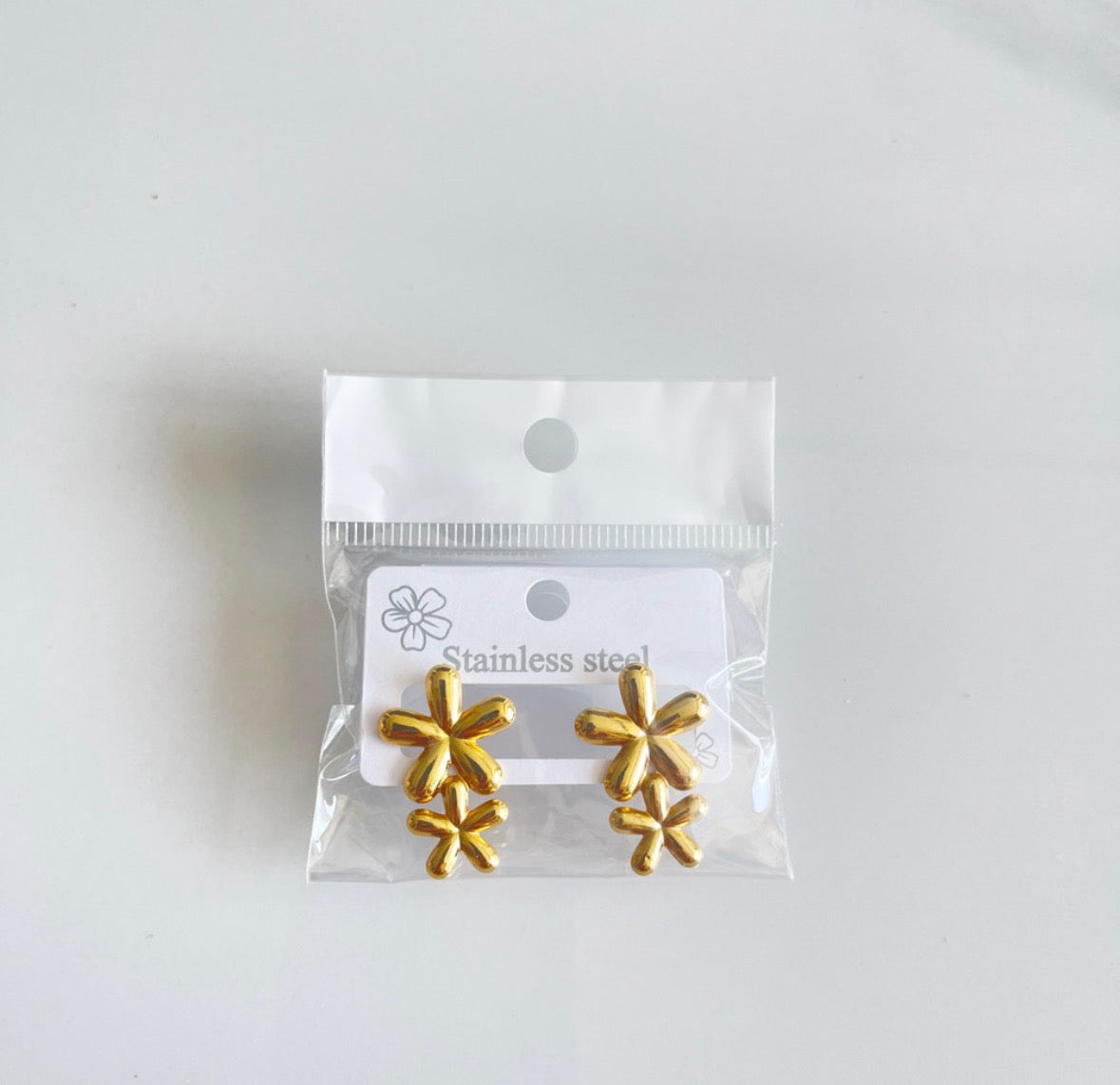 E5103 Aretes doble flores doradas acero inoxidable 3cm