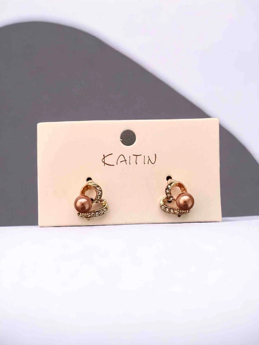 E1323 Aretes mini corazón zirconia perla café 1.5cm