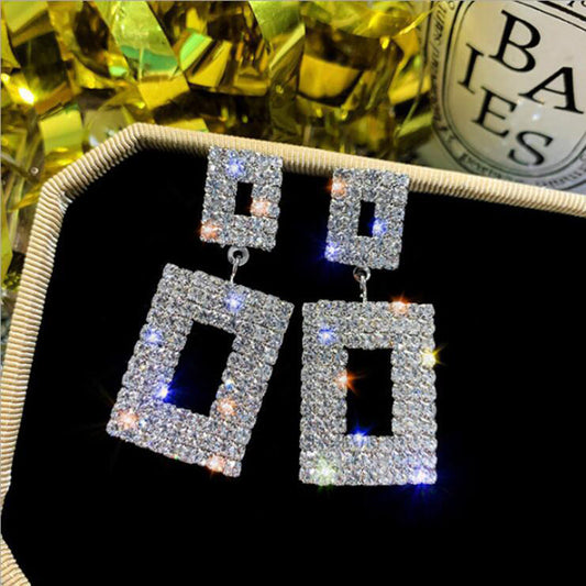 E3311P Aretes brillantes fiesta aleacion 4cm