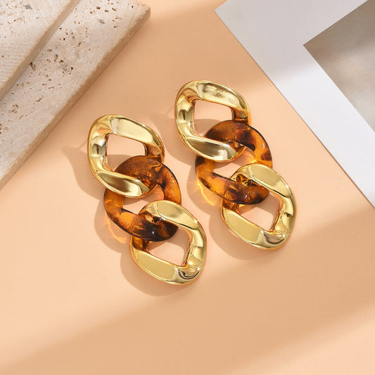 E7149 Aretes geométricos dorados animal print aleacion 8cm