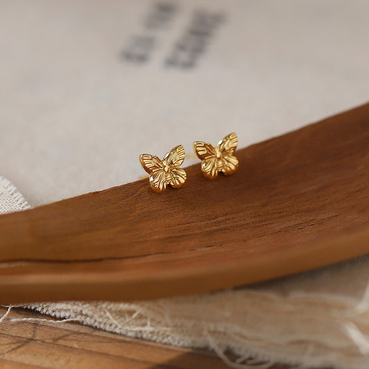 E2958 Aretes mariposa acero de titanio 0.5cm