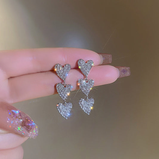 E4651 Aretes corazones plateados aleacion 4cm