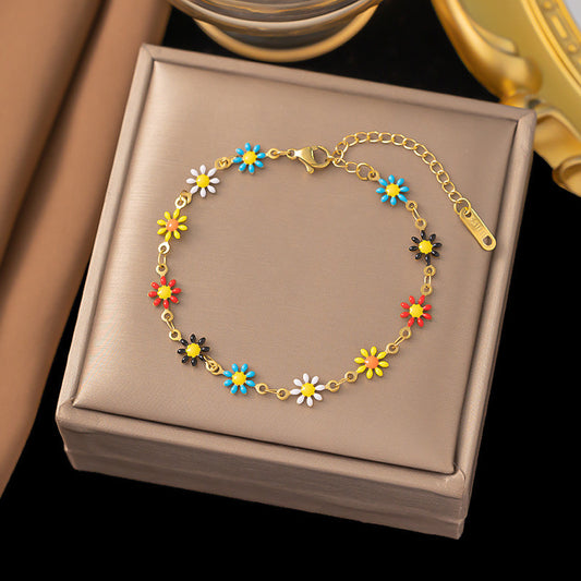 B491 Pulsera flores de colores acero titanio 20cm