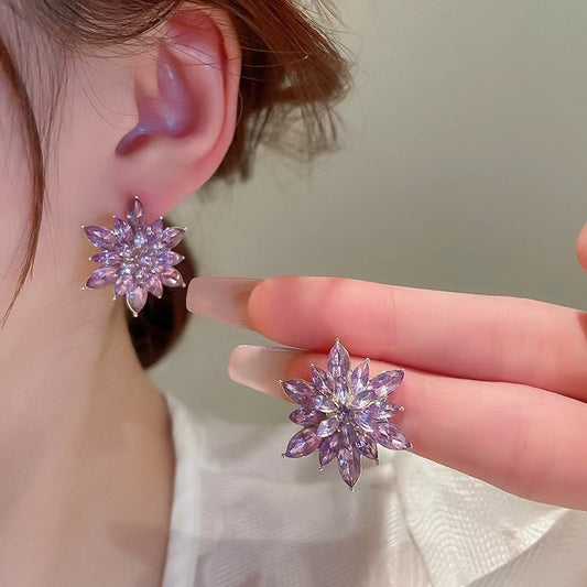 E3908 Aretes flor cristal morada 2cm