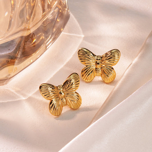 E2561 Aretes mariposa acero inoxidable 1.5cm