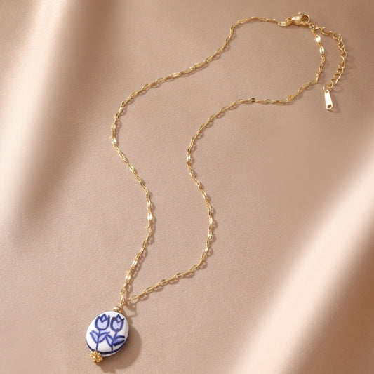 C1013 collar circulo de ceramica  estilo porcelana acero inoxidable 21 cm de largo 1 cm dije