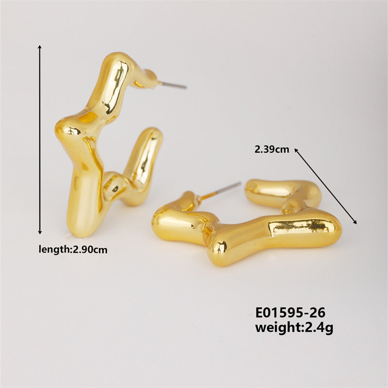 J654 Aretes estrella doradas brillantes cubierta de cobre 2.5cm