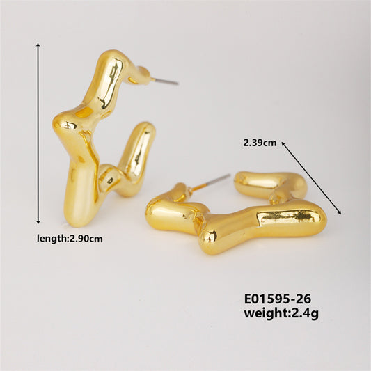 J654 Aretes estrella doradas brillantes cubierta de cobre 2.5cm