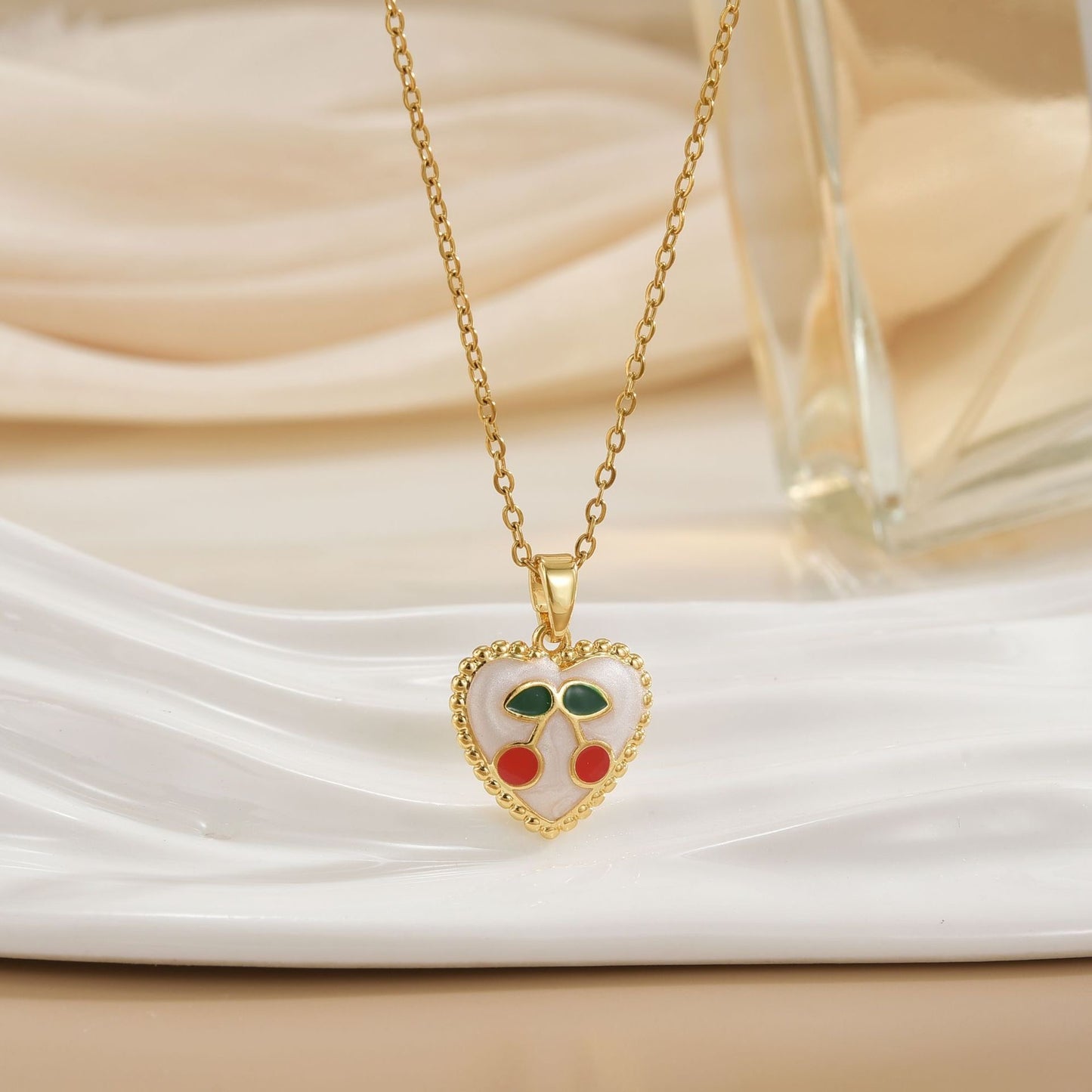 J637 Collar corazon cerezas acero titanio 19cm, dije 1cm