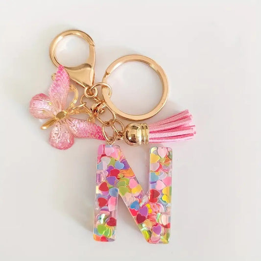 K104 Llavero rosa letra N resina 9cm