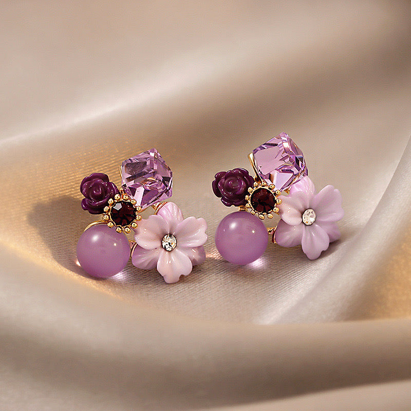E4940 Aretes flor morada aleacion 2cm