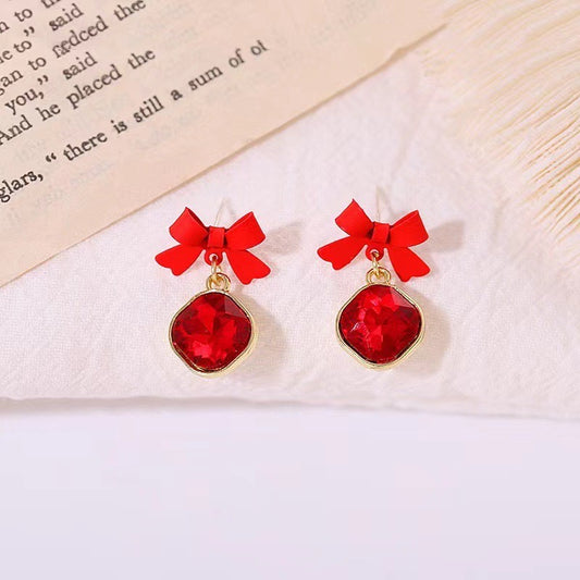 E3681 Aretes moño cristal rojo brillante aleacion 2.5cm