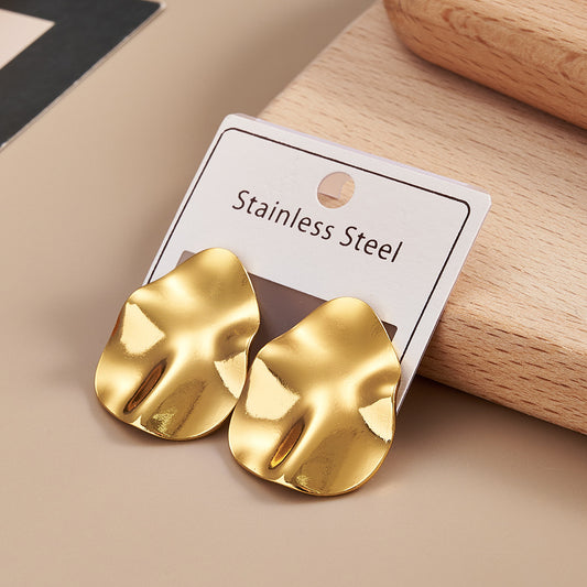 J594 aretes óvalo dorado acero inoxidable 3cm