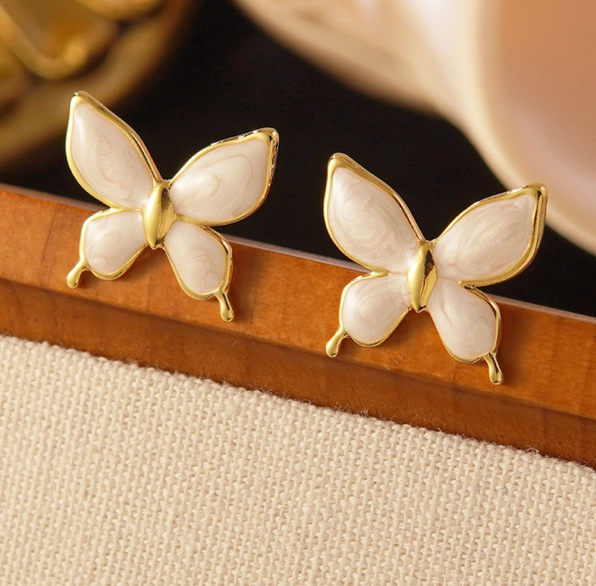 E5546 Aretes mariposa nude acero inoxidable