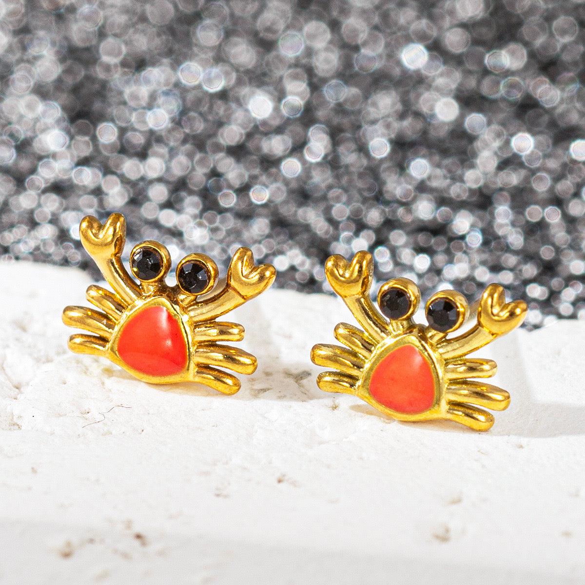 E3520 Aretes cangrejo rojo acero de titanio 1cm