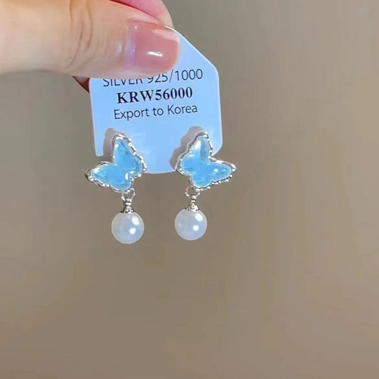 E3855 Aretes mariposa perla 2cm aleacion